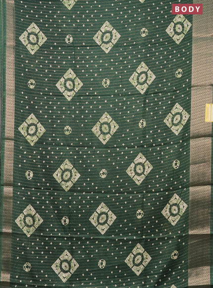Semi dola saree green with allover zari weaves & batik prints and zari woven border
