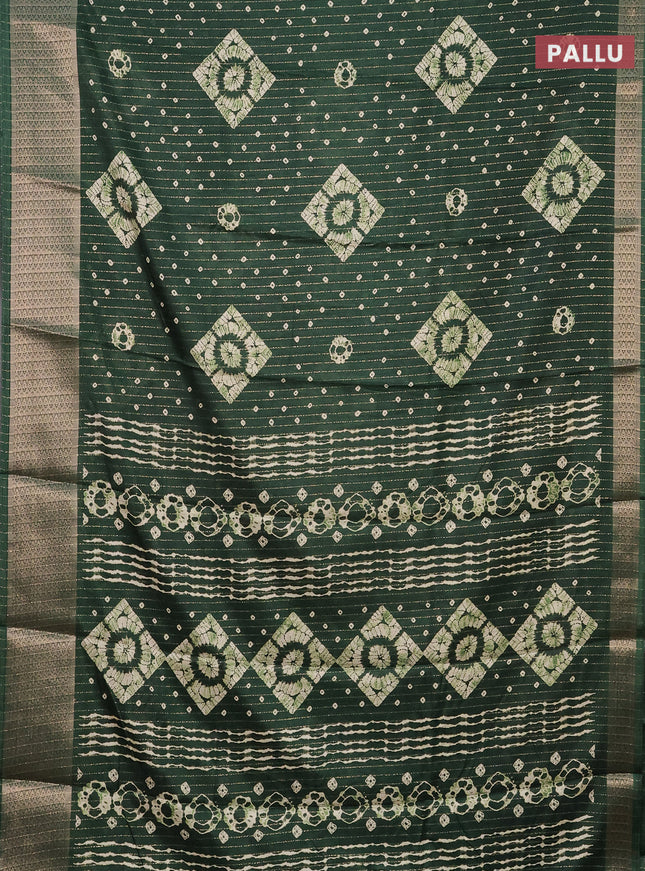 Semi dola saree green with allover zari weaves & batik prints and zari woven border