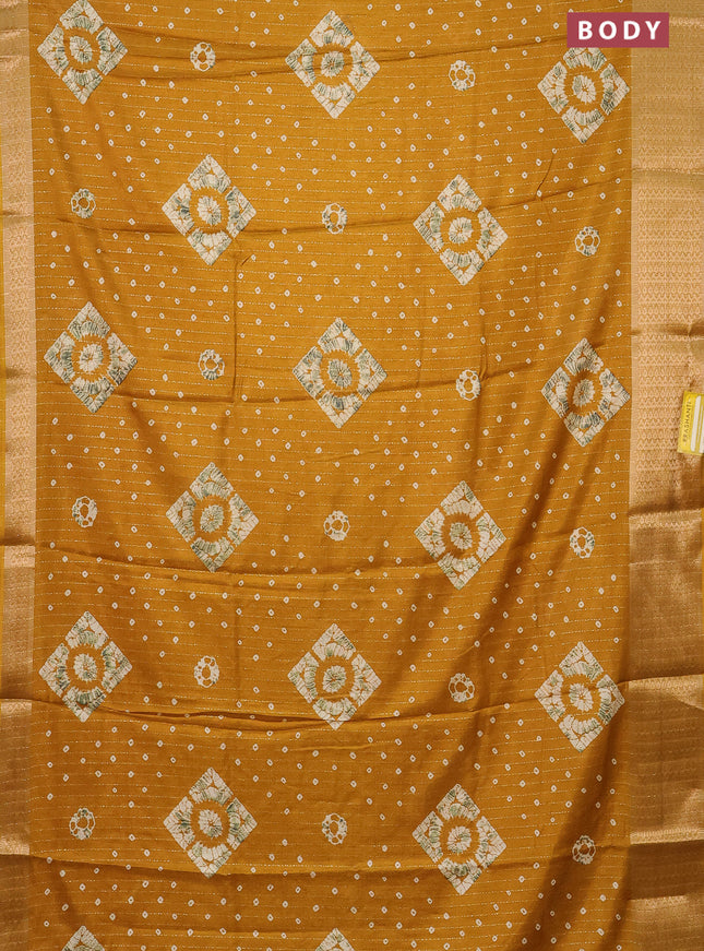 Semi dola saree mustard yellow with allover zari weaves & batik prints and zari woven border