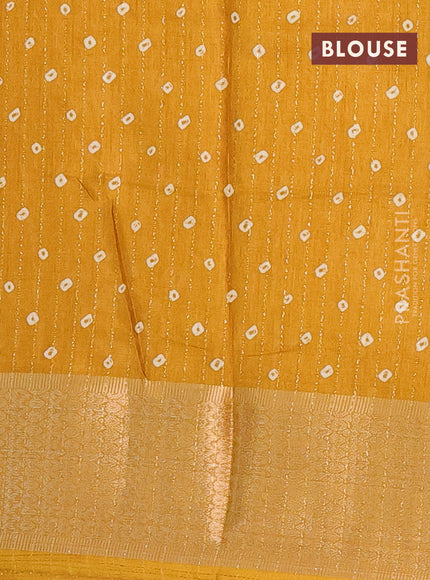 Semi dola saree mustard yellow with allover zari weaves & batik prints and zari woven border