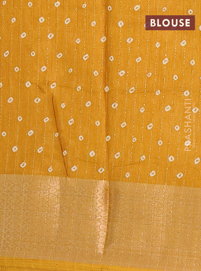 Semi dola saree mustard yellow with allover zari weaves & batik prints and zari woven border