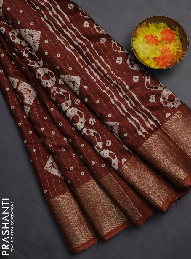 Semi dola saree brown with allover zari weaves & batik prints and zari woven border