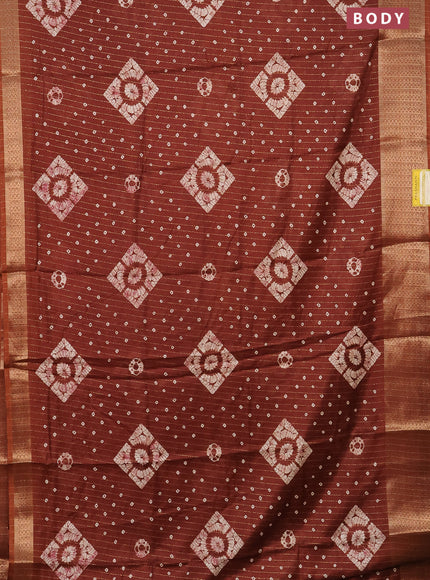 Semi dola saree brown with allover zari weaves & batik prints and zari woven border