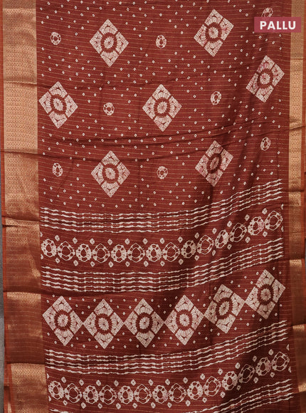 Semi dola saree brown with allover zari weaves & batik prints and zari woven border