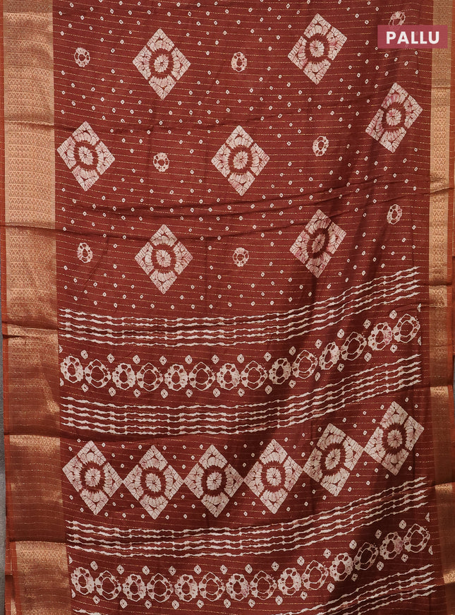 Semi dola saree brown with allover zari weaves & batik prints and zari woven border