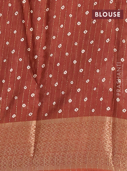 Semi dola saree brown with allover zari weaves & batik prints and zari woven border