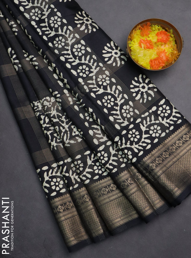 Semi dola saree black with allover zari weaves & batik prints and zari woven border
