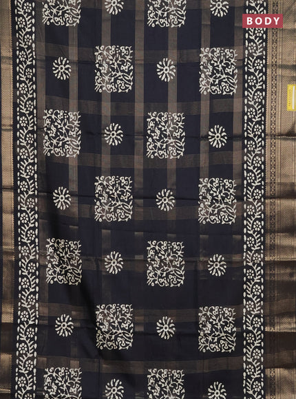 Semi dola saree black with allover zari weaves & batik prints and zari woven border