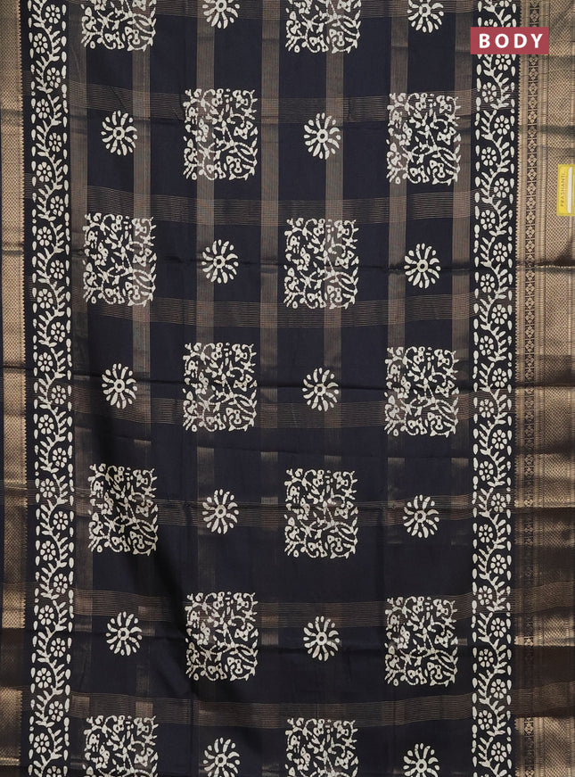 Semi dola saree black with allover zari weaves & batik prints and zari woven border