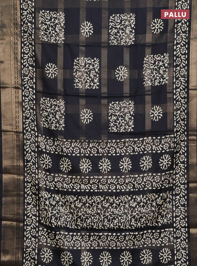Semi dola saree black with allover zari weaves & batik prints and zari woven border