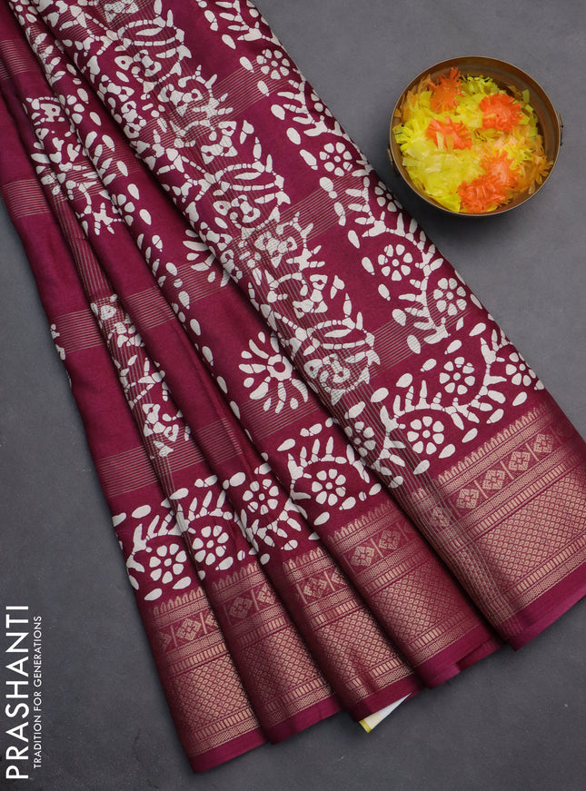 Semi dola saree wine shade with allover zari weaves & batik prints and zari woven border