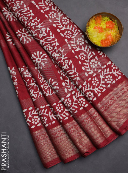 Semi dola saree maroon with allover zari weaves & batik prints and zari woven border