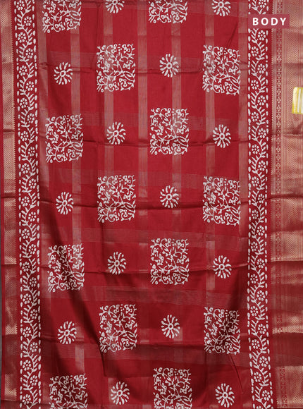 Semi dola saree maroon with allover zari weaves & batik prints and zari woven border