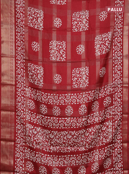 Semi dola saree maroon with allover zari weaves & batik prints and zari woven border