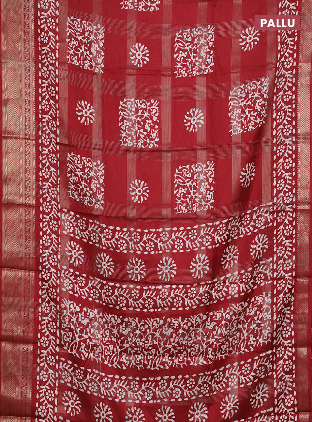 Semi dola saree maroon with allover zari weaves & batik prints and zari woven border