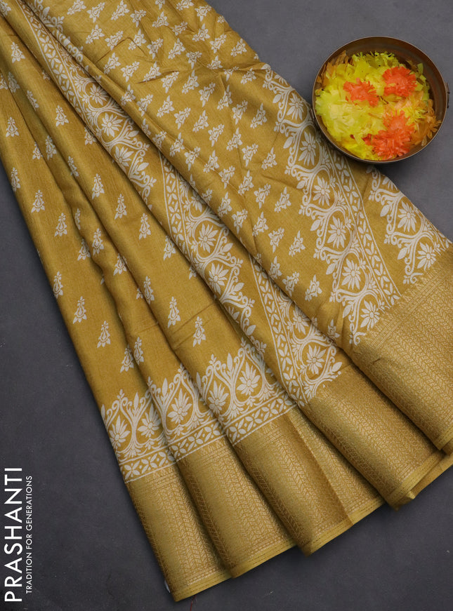 Semi dola saree yellow with butta prints and zari woven border