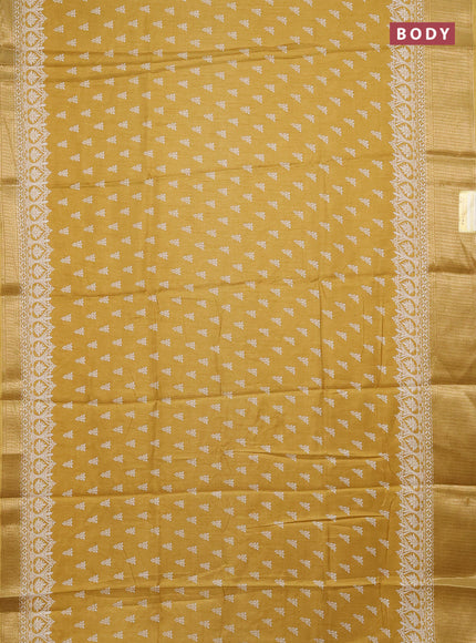 Semi dola saree yellow with butta prints and zari woven border