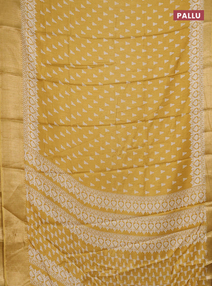 Semi dola saree yellow with butta prints and zari woven border