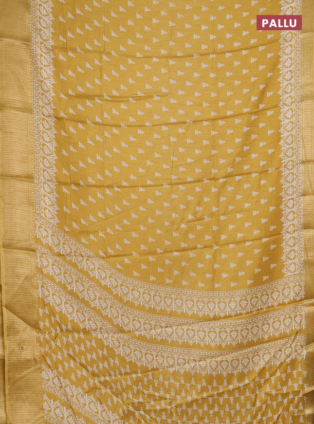 Semi dola saree yellow with butta prints and zari woven border