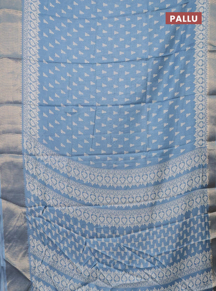 Semi dola saree blue shade with butta prints and zari woven border