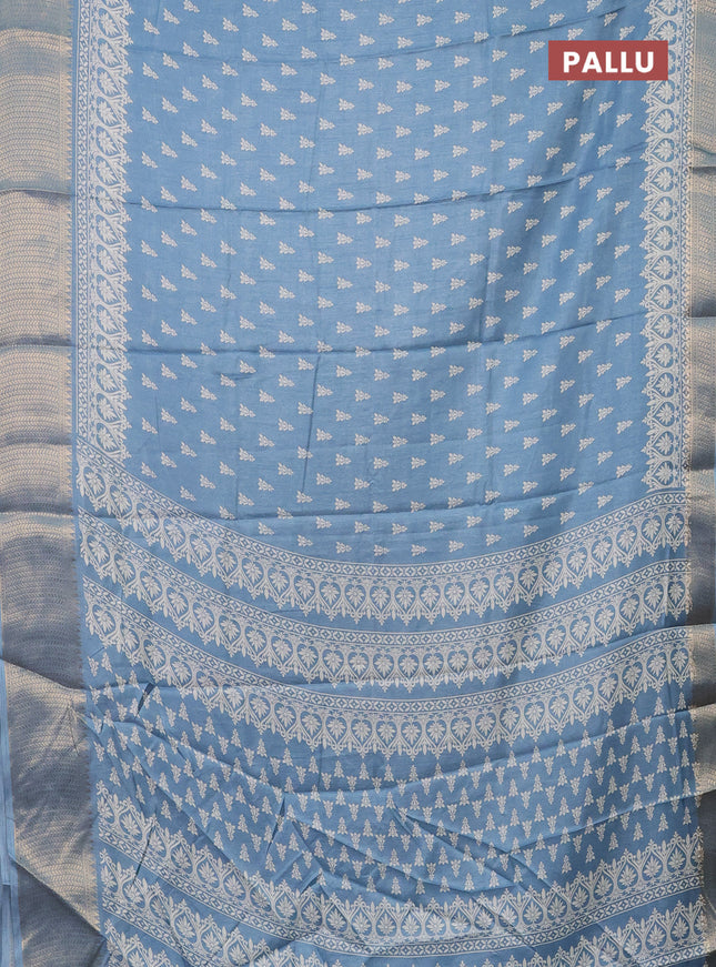 Semi dola saree blue shade with butta prints and zari woven border