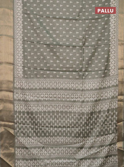 Semi dola saree greyish green with butta prints and zari woven border