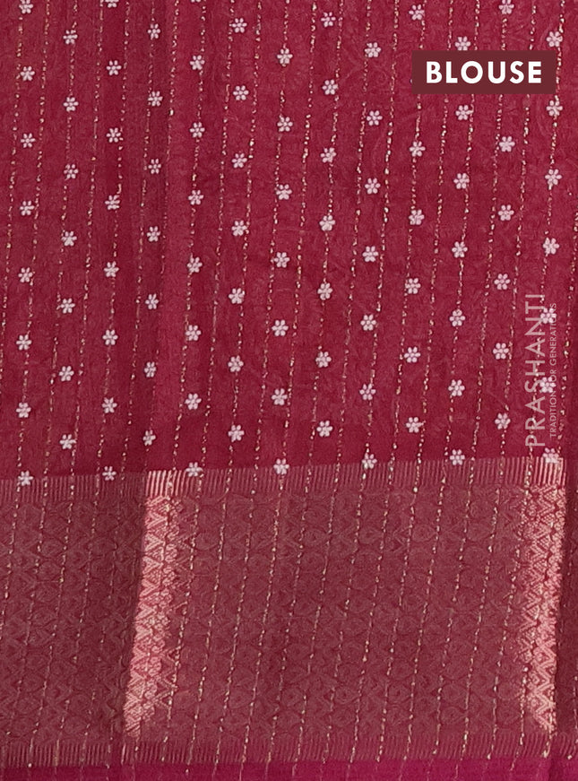 Semi dola saree wine shade with allover zari weaves & buttas and zari woven border