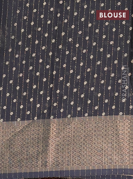 Semi dola saree black with allover zari weaves & buttas and zari woven border