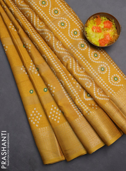 Semi dola saree mustard yellow with allover zari checks & bandhani prints and zari woven border