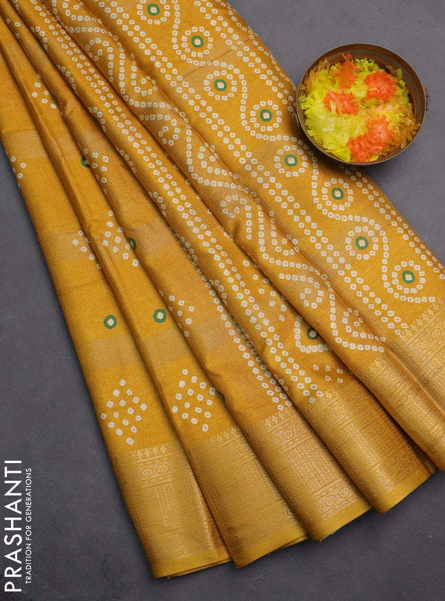 Semi dola saree mustard yellow with allover zari checks & bandhani prints and zari woven border
