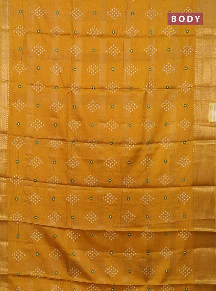 Semi dola saree mustard yellow with allover zari checks & bandhani prints and zari woven border