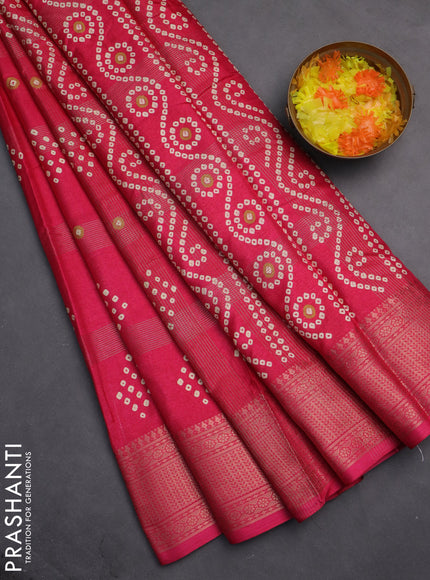 Semi dola saree pink with allover zari checks & bandhani prints and zari woven border