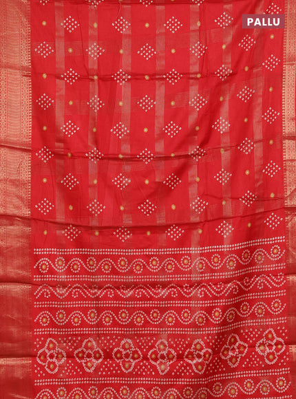 Semi dola saree red with allover zari checks & bandhani prints and zari woven border