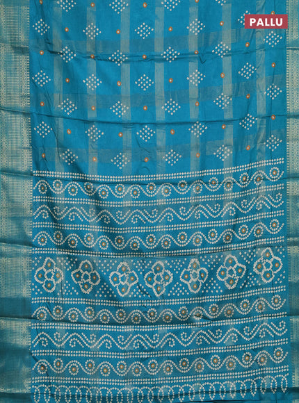 Semi dola saree teal green shade with allover zari checks & bandhani prints and zari woven border
