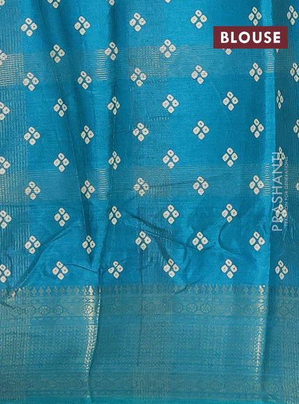 Semi dola saree teal green shade with allover zari checks & bandhani prints and zari woven border