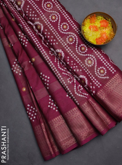 Semi dola saree wine shade with allover zari checks & bandhani prints and zari woven border