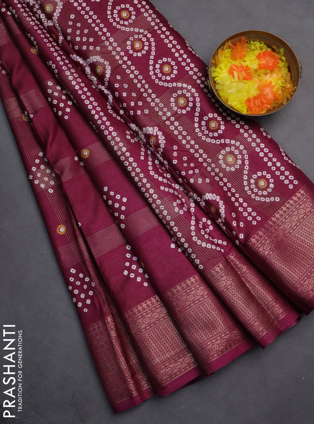 Semi dola saree wine shade with allover zari checks & bandhani prints and zari woven border