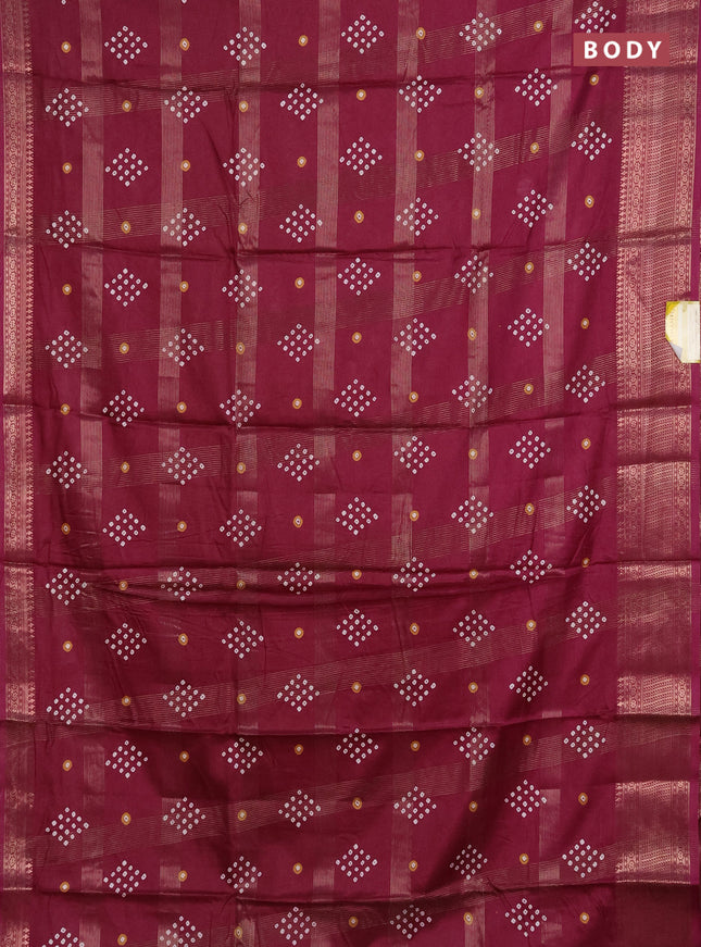 Semi dola saree wine shade with allover zari checks & bandhani prints and zari woven border