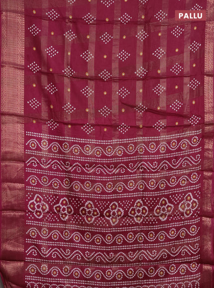 Semi dola saree wine shade with allover zari checks & bandhani prints and zari woven border