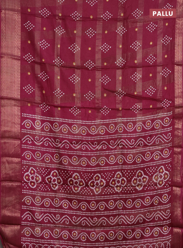 Semi dola saree wine shade with allover zari checks & bandhani prints and zari woven border