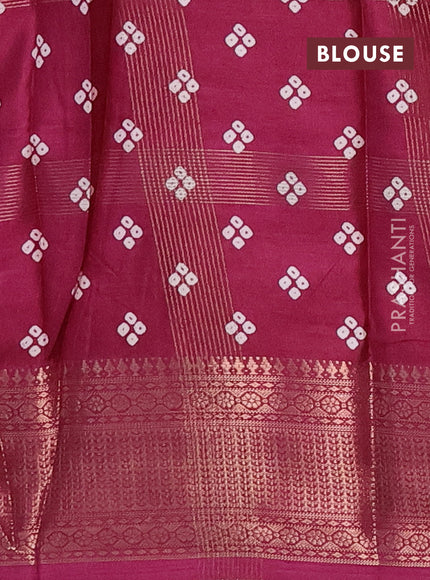 Semi dola saree wine shade with allover zari checks & bandhani prints and zari woven border