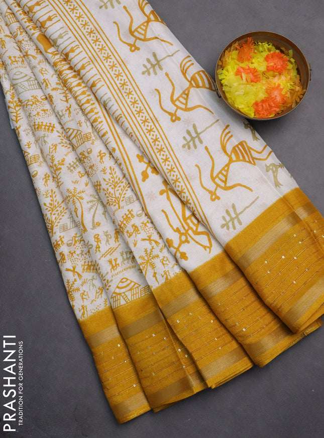 Semi dola saree off white and mustard yellow with allover warli prints and zari woven sequin work border