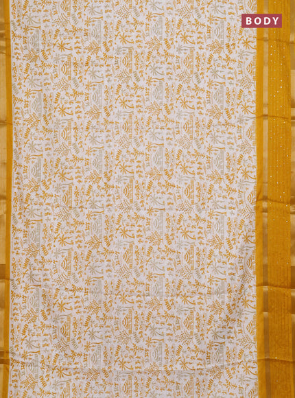 Semi dola saree off white and mustard yellow with allover warli prints and zari woven sequin work border