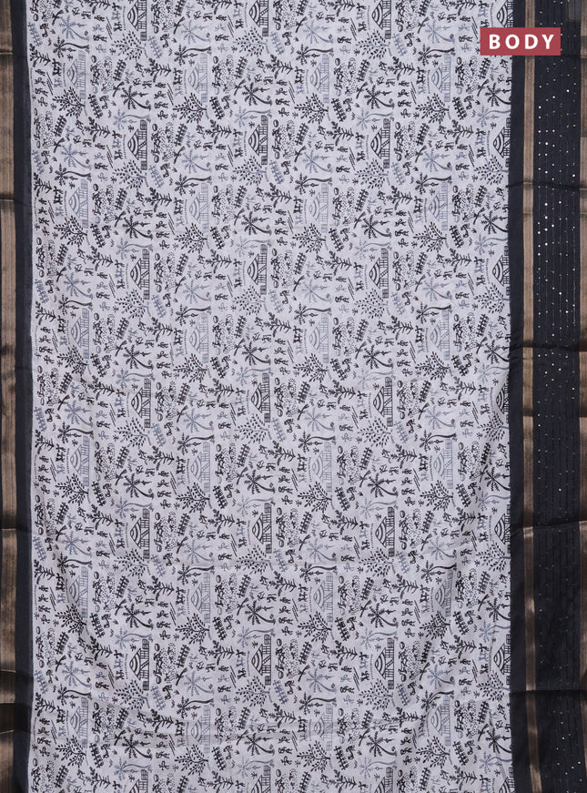 Semi dola saree off white and black with allover warli prints and zari woven sequin work border