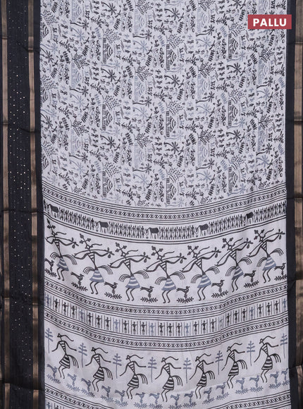 Semi dola saree off white and black with allover warli prints and zari woven sequin work border