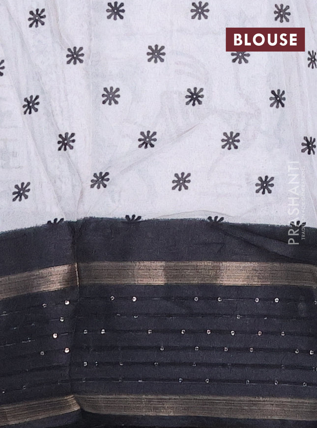 Semi dola saree off white and black with allover warli prints and zari woven sequin work border