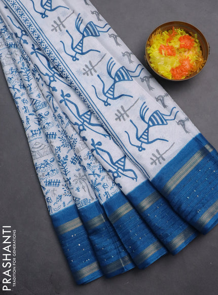 Semi dola saree off white and cs blue with allover warli prints and zari woven sequin work border