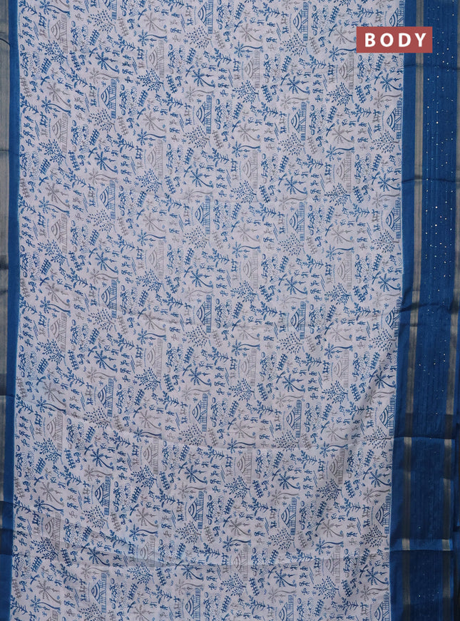 Semi dola saree off white and cs blue with allover warli prints and zari woven sequin work border