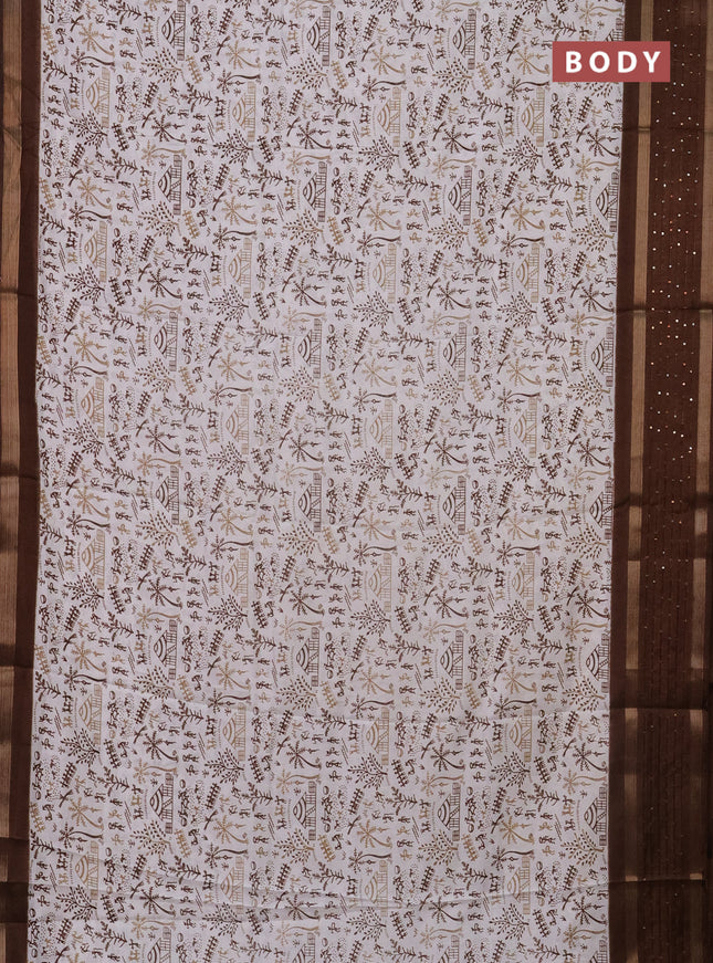 Semi dola saree off white and brown with allover warli prints and zari woven sequin work border