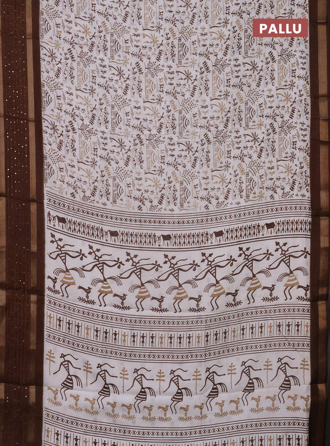 Semi dola saree off white and brown with allover warli prints and zari woven sequin work border